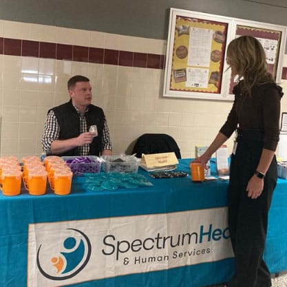 shswny-harm-reduction-Chris-giving-out-Narcan-at-Cheektowga-school-event